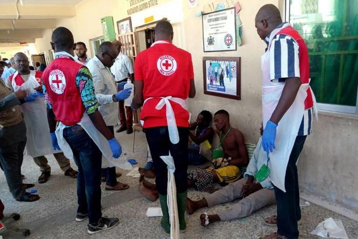 Three bombers detonated their explosives outside a hall in Konduga, 38 kilometres (24 miles) from the Borno state capital Maiduguri, where football fans were watching a match on TV on Sunday evening