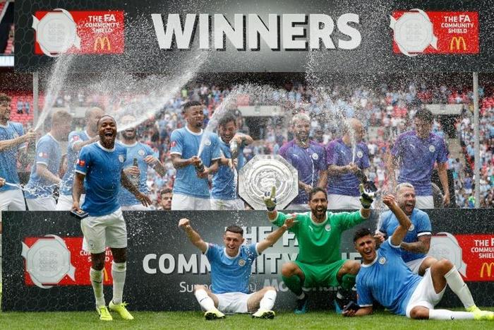 Manchester City celebrate after beating Liverpool in the Community Shield