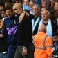 Spoils shared: Mauricio Pochettino (left) and Pep Guardiola (right) embrace after Manchester City and Tottenham drew 2-2 on Saturday