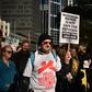 Demonstrators march in Sydney during a protest to demand humane treatment of asylum seekers and refugees on remote Pacific islands