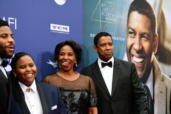 Denzel Washington (right, with his wife Pauletta and two of their four children, Malcolm and Katia) is one of only four black stars to win a best actor Oscar