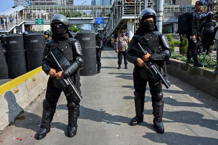 Peaceful protests against president Joko Widodo's re-election erupted into street battles between police and rioters in central Jakarta