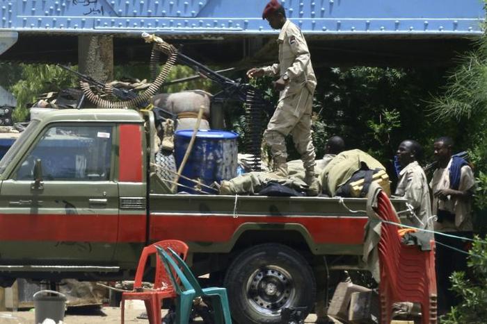 Sudan's paramilitary Rapid Support Forces patrol Nile Street in the capital Khartoum on Monday