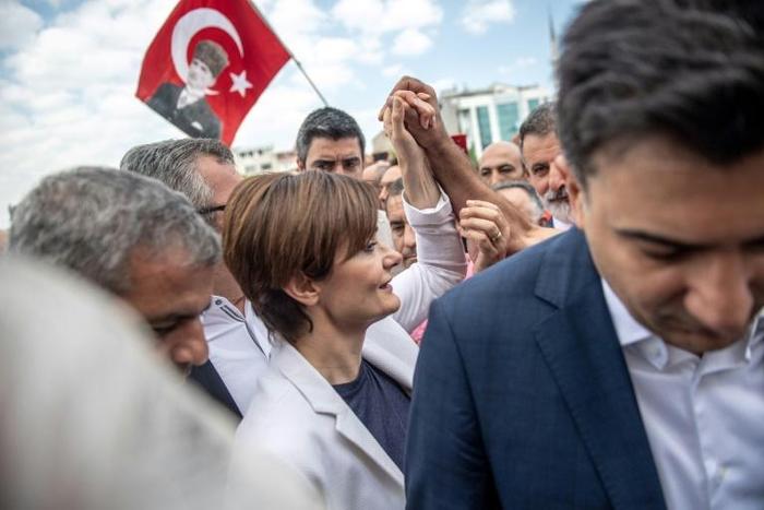 Canan Kaftancioglu, seen outside the court house, faces up to 17 years in prison for allegedly "insulting" President Erdogan on Twitter