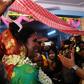 Indian transgender woman Tista Das (L), 38, and transgender man Dipan Chakravarthy, 40, perform the rituals of a traditional Hindu marriage ceremony, pledging their love for each other before family and friends, in Kolkata