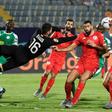 Dylan Bronn (R) of Tunisia concedes the own goal that gave Senegal victory in an Africa Cup of Nations semi-final in Cairo