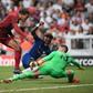 Liverpool goalkeeper Adrian (right) was injured by a celebrating supporter after Wednesday's UEFA Super Cup win over Chelsea