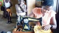 Kindhearted Ghanaian teacher sews her pupils’ torn uniforms during lunch breaks