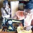 Kindhearted Ghanaian teacher sews her pupils’ torn uniforms during lunch breaks