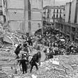 Firemen search for wounded people after a bomb exploded at the Argentine Israelite Mutual Association in Buenos Aires on July 18, 1994
