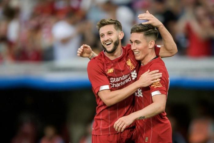 Liverpool's Welsh midfielder Harry Wilson celebrates scoring his team's third goal