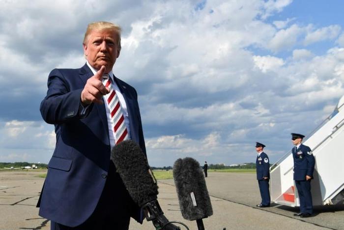 US President Donald Trump gives a statement about the mass shootings in El Paso and Dayton before leaving New Jersey for Washington