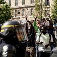 Undocumented migrants and supporters surged into the Pantheon memorial in Paris to demand that their situations be regularised