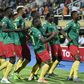 Cameroon's forward Stephane Bahoken (R) celebrates his goal