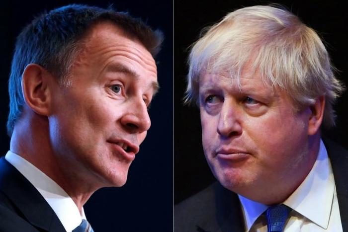 Britain will learn on Tuesday whether Jeremy Hunt (l) or Boris Johnson is the new prime minister