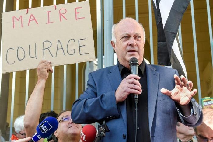 The French mayor told a local court 'nothing had been done' to protect people against pesticides