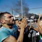 Palestinians protest against a labour crackdown, outside a refugee camp south of the Lebanese capital Beirut