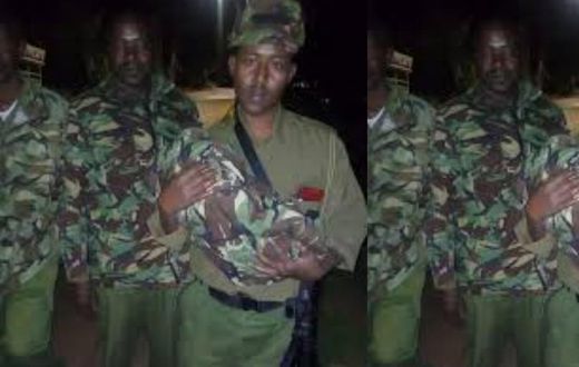 Police officer wraps someone’s baby in his uniform together with the umbilical cord and placenta