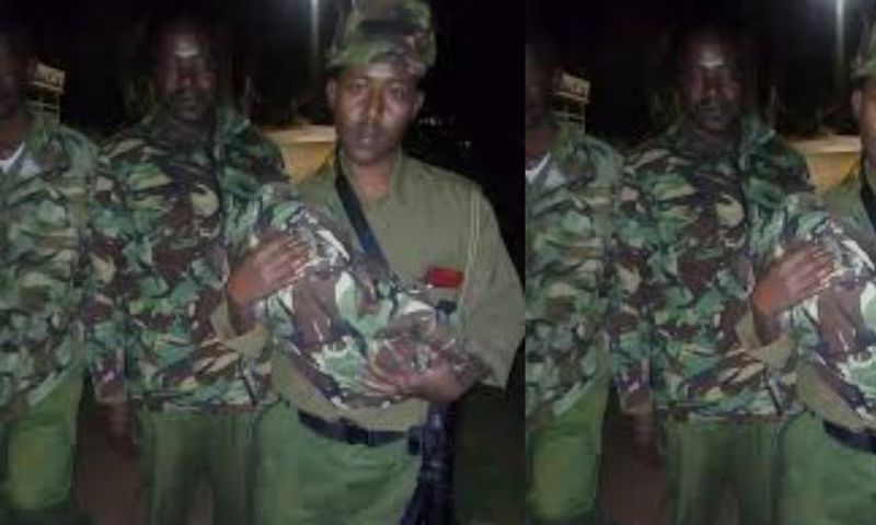 Police officer wraps someone’s baby in his uniform together with the umbilical cord and placenta
