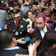 Protesters covered Mexico City's security minister, Jesus Orta, with pink glitter at a demonstration demanding justice for two teenage girls who say they were raped by police