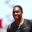 South Africa's Caster Semenya smiles after winning the women's 800m at the Prefontaine Classic Diamond League meeting, but says she'll skip the World Championships if she loses her legal battle with the IAAF regarding testosterone levels in female athl...