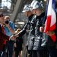 A veteran meets firefighters at the Eiffel Tower