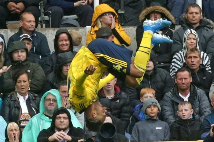Arsenal striker Pierre-Emerick Aubameyang celebrates his winner at Newcastle