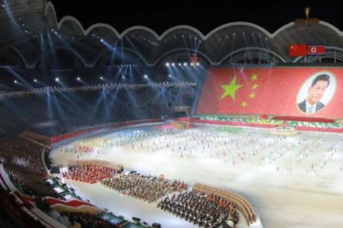 Xi may be the face I can't forget: a huge portrait of the Chinese president was part of the Mass Games at which he was guest of honour