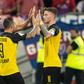 Marco Reus (R) and Paco Alcacer (L) both found the net as Borussia Dortmund progressed to the second round of the German Cup on Friday