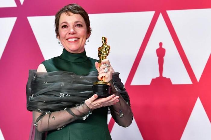 Olivia Colman was awarded the CBE by the queen to mark her 93rd birthday