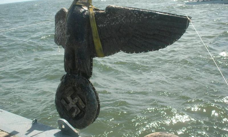 A photo of the Nazi eagle on the Admiral Graf Spee the day it was recovered in 2006