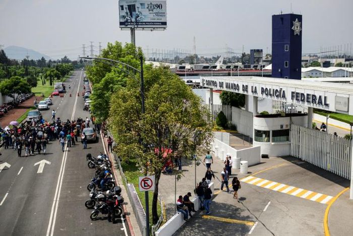 Members of the Federal Police protest against what they call forced transfers to the newly created National Guard, outside the Federal Police headquarters in Mexico City on July 4, 2019
