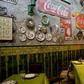 A waiter waits for clients at San Cristobal restaurant in Havana, enduring a slowdown blamed on new US sanctions