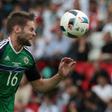Oliver Norwood's decision to retire form international football at the age of 28 is a big mistake according to Northern Ireland manager Michael O'Neill