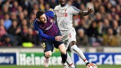 Guinea star Naby Keita (R) playing for Liverpool against Lionel Messi of Barcelona during a UEFA Champions League semi-final last month