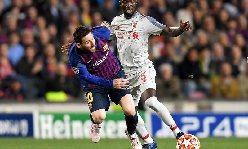 Guinea star Naby Keita (R) playing for Liverpool against Lionel Messi of Barcelona during a UEFA Champions League semi-final last month