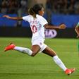 Cameroon's Yvonne Leuko (R) challenges Canada's Ashley Lawrence during the countries' group-stage encounter