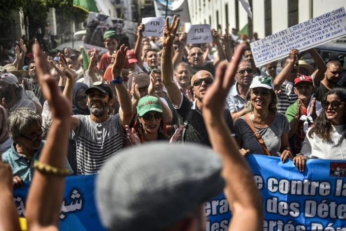 Protesters called for the resignation of the army chief and other political figures in Algeria on Friday, as demonstrations moved into a seventh month