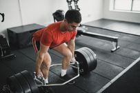 Deadlifting a Weighted Bar