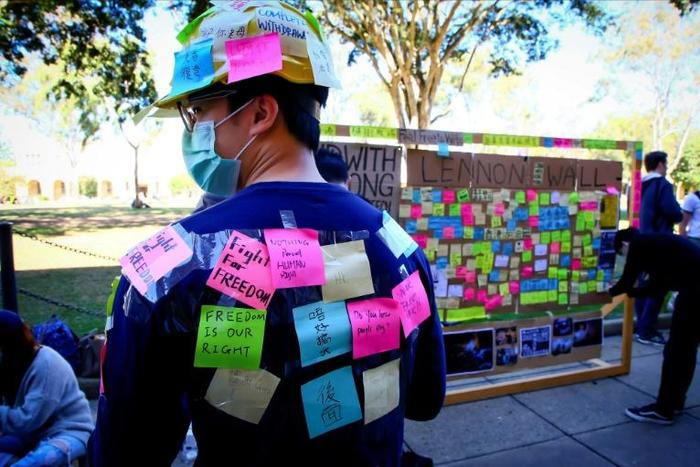 Protesters wear masks to prevent their identities being shared online