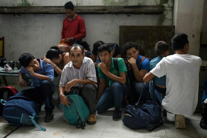 Some of the 250 Central American migrants arrested during an operation in Veracruz, Mexico, are pictured in June 2019