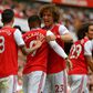 Arsenal defender David Luiz congratulates Alexandre Lacazette