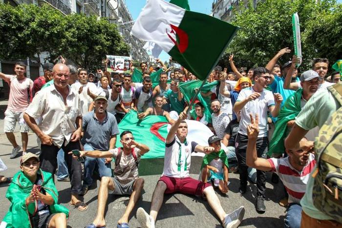 Algerians were back on the streets Friday for anti-government protests boosted by anticipation as the national team prepares to battle Senegal in Cairo in the Africa Cup of Nations final