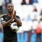 Raheem Sterling carries the match ball after scoring a hat-trick for Manchester City against West Ham