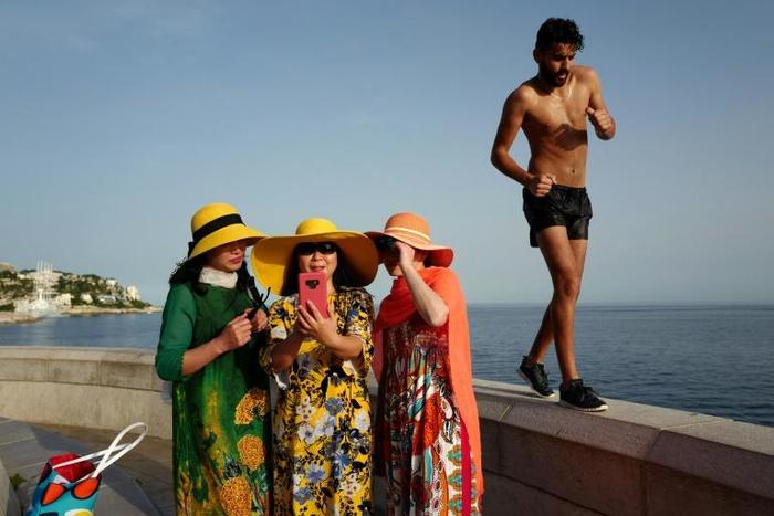 Tourists across France were sizzling as the heat began to build before peaking later this week