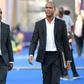 Clarence Seedorf and his assistant Patrick Kluivert arrive for the match against Nigeria in Africa Cup of Nations round of 16, their last in charge of Cameroon
