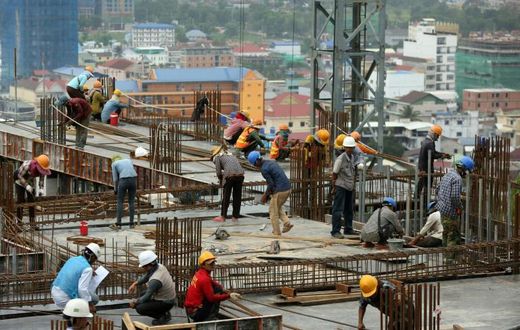 Tens of thousands of Cambodian day-labourers work on the mushrooming construction sites in Sihanoukville