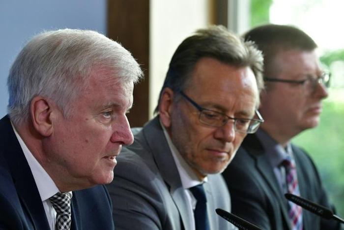 Interior Minister Horst Seehofer (Left)called the killing an 'alarm bell' for Germany and acknowledged that 'right-wing extremism is a significant and serious danger for our society'