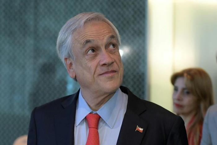 Chile's President Sebastian Pinera -- seen here during a visit to South Korea in April 2019 -- has shaken up his cabinet in the face of faltering popularity ratings