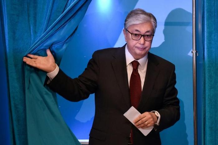 Kazakh President Kassym-Jomart Tokayev voted early but acknowledged his predecessor Nursultan Nazarbayev "was still in power in the capacity of chairman of the security council... and other capacities"